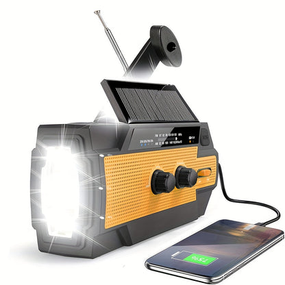 Portable emergency radio with solar panels, flashlight and SOS alarm